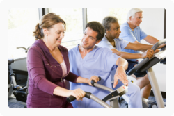 a caregiver and an old woman doing physical therapy